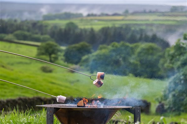 Marshmallow toasting Yorkshire Dales glamping